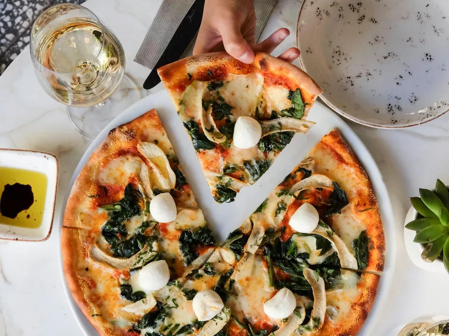 Sharing a pizza at the table